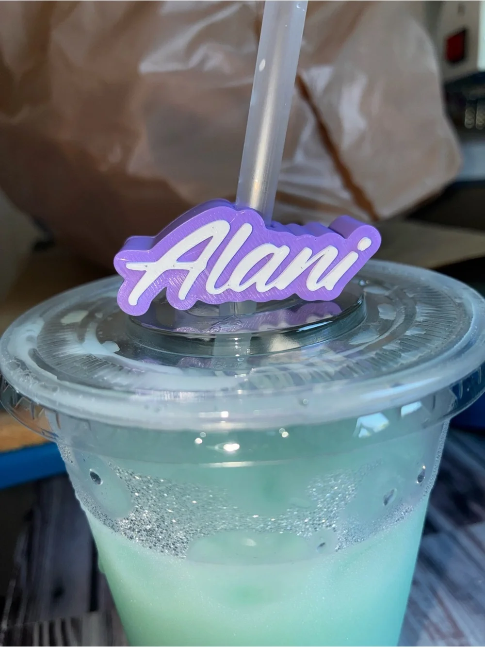 Alani Purple and White 'Alani' Straw Charm